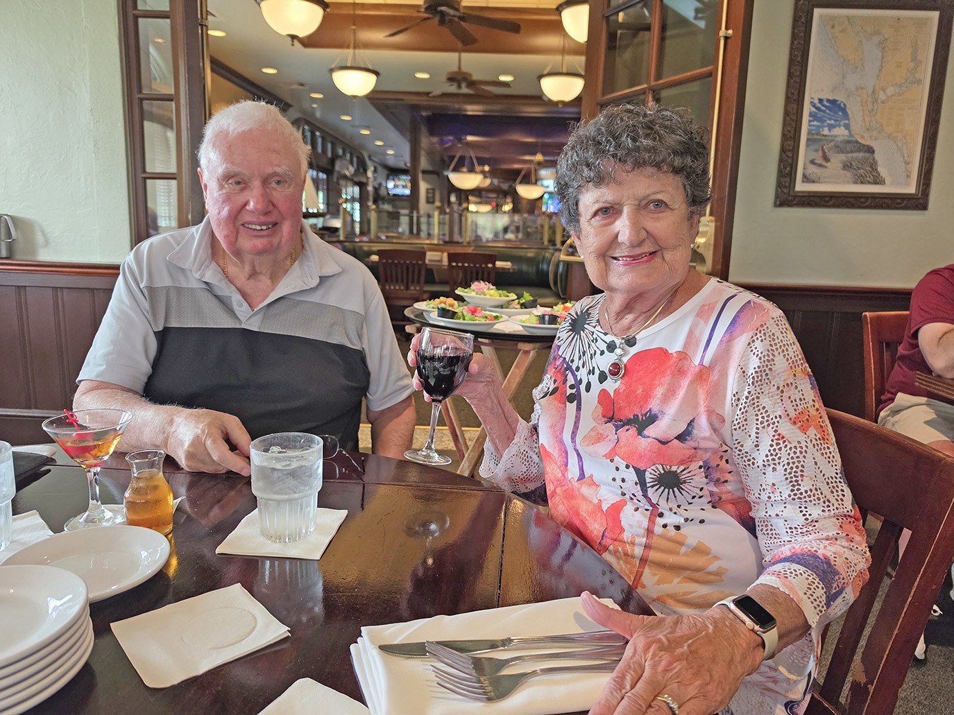 Gary and Carol Brown raising a glass at University Grill